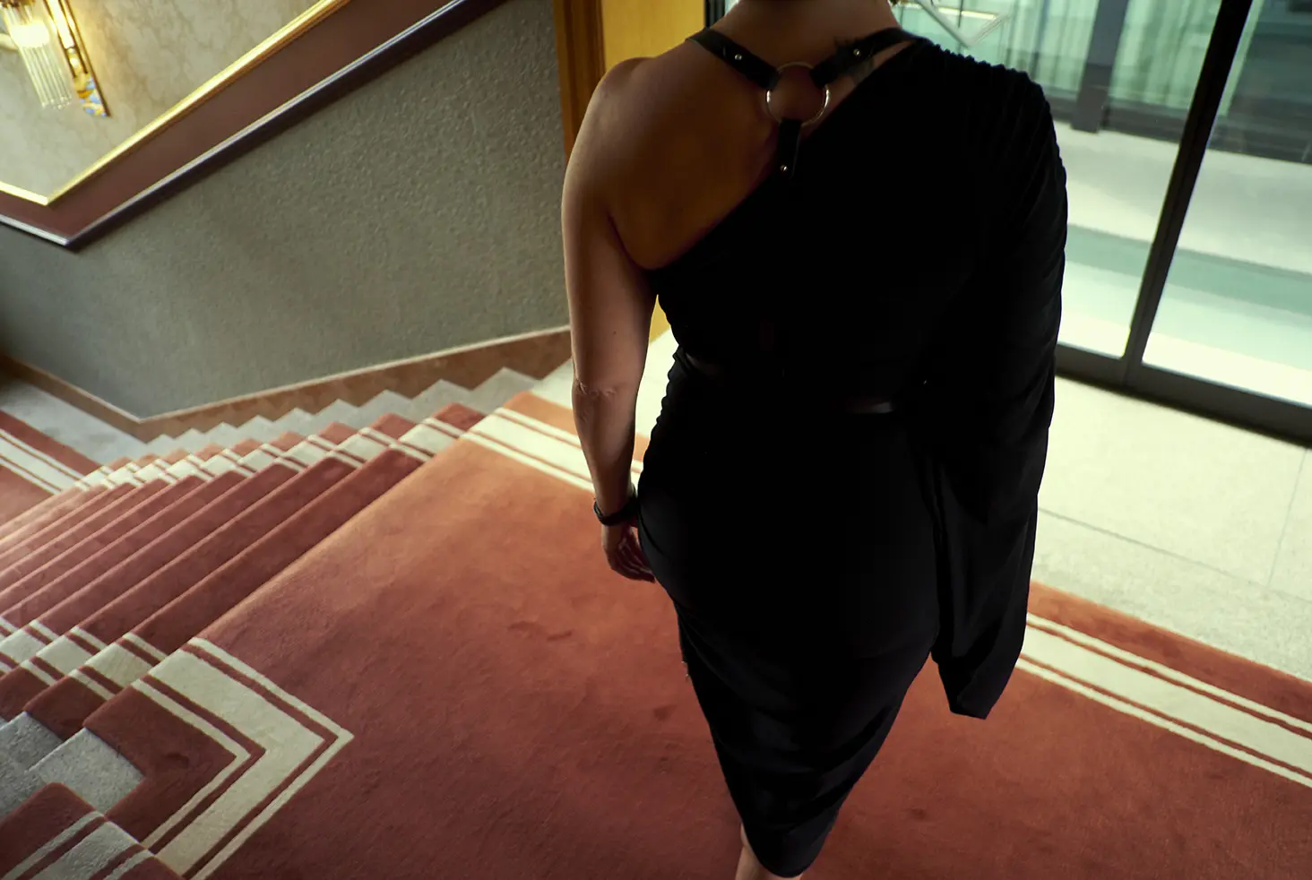 yvonne reichmuth walks down the stairs at the dolder grand